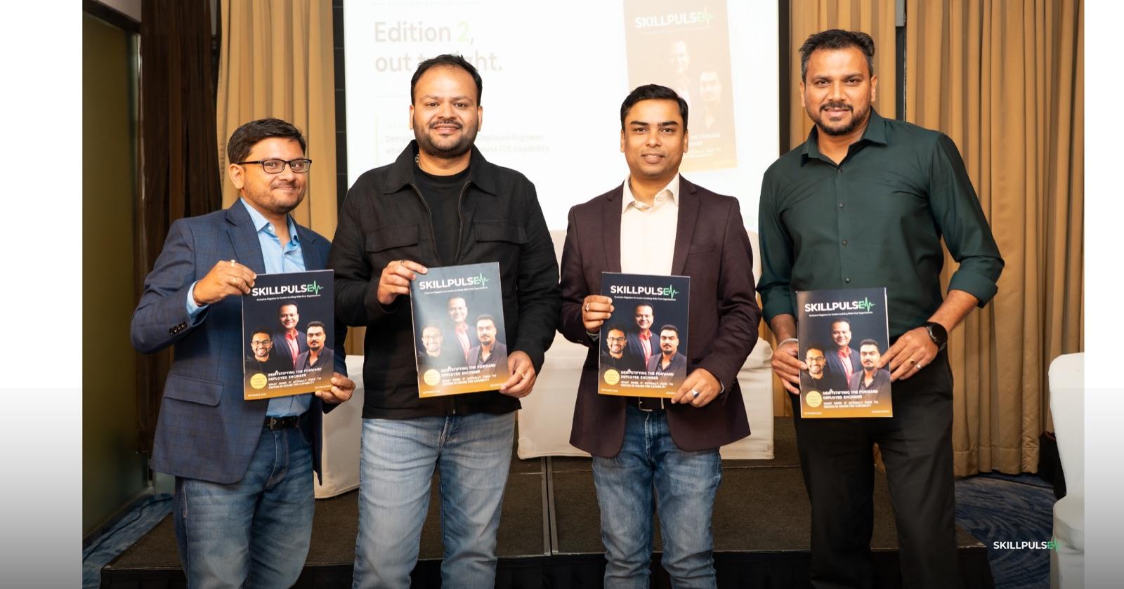 Four leaders holding copies of SkillPulse Edition 02 at its launch